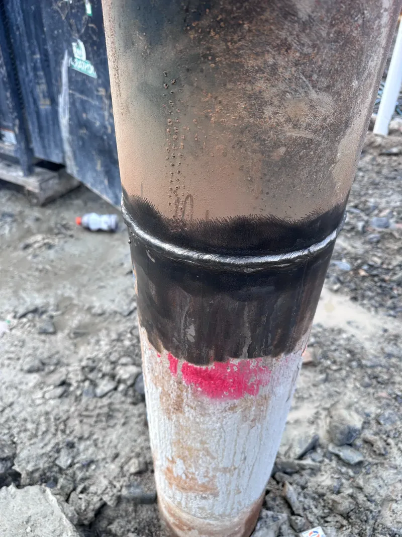 Circumferential welded splice joining round steel pipe pile sections